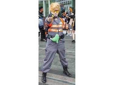 Megan Titus cosplays Jullian Holtzmann from the latest Ghostbusters movie poses at Anime Revolution, a three-day convention of  activities, exhibits, panels and performances of the popular Japanese-born anime art form in Vancouver Sunday August 7, 2016.
