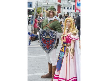 Kevin McCollum as Link, left and Michelle Orosz as Princess Zelda, right pose at Anime Revolution, a three-day convention of  activities, exhibits, panels and performances of the popular Japanese-born anime art form in Vancouver Sunday August 7, 2016.