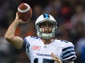Toronto Argonauts' Ricky Ray looks for an open receiver before throwing the ball out of bounds during the first half of a CFL football game against the B.C. Lions in Vancouver, B.C., on Thursday July 7, 2016.