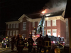 Fire crews battle a four-alarm blaze at Carleton Elementary. PATTI BACCHUS / TWITTER