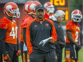 Khari Jones coaching at Lions practice on Tuesday.