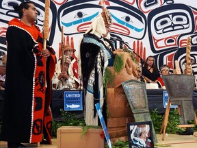 Darin Swanson, head chief of the Yahgulaanaas/Janaas clan at the ceremony where two hereditary chiefs were stripped of their titles. Ernest Swanson, his nephew is to the left holding a staff.