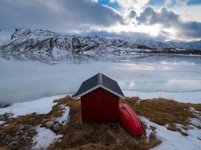 A private fishing cabin is photographed in an inside fjord near Svolvaer, in Lofoten archipelago, Arctic Circle, on March 12, 2016.