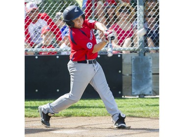 Hastings Community Little League #13 Cristian Santarelli hits a home run against the Alberta's Southwest Little league in a semi final game at the Canadian Little League Championships, Vancouver, August 12 2016.