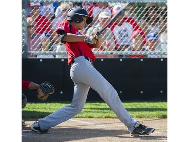 Hastings Community Little League #24 Loreto Siniscalchi hits a home run against Alberta's Southwest Little league in a semi final game at the Canadian Little League Championships, Vancouver, August 12 2016.