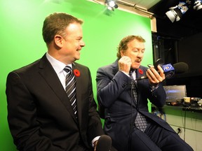 Vancouver  B.C. NOV 1, 2010    John Garrett former NHLer and current color commentator for Sports Net ,  (right)   with John Shorthouse- Canucks broadcaster (left)  for a feature on pro athletes-turned-commentators  in Vancouver at Rogers Arena on November 1,  2010.    (Mark van Manen/PNG)   See Yvonne Zacharias Sports  /    Brad Ziemer Sun Sports stories )       (Mark van Manen/PNG)       [PNG Merlin Archive]