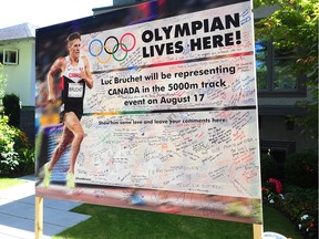 Luc Bruchet's landlord has erected a sign in front of his Vancouver home and provided a whiteboard and pens so passerbys can write well wishes to the first time Olympian from White Rock,who will compete in Rio on Wednesday in the 5,000 metre track race. NICK PROCAYLO/PNG