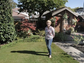 Valerie Hutton in her garden in East Vancouver