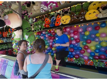 Thousands of people enjoyed the sunshine for the opening of the PNE in Vancouver, BC Saturday, August 20, 2016.