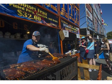 Thousands of people enjoyed the sunshine for the opening of the PNE in Vancouver, BC Saturday, August 20, 2016. Pictured is Boss Hog's Smokin' Chophouse.