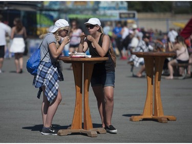 Thousands of people enjoyed the sunshine for the opening of the PNE in Vancouver, BC Saturday, August 20, 2016.