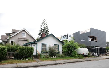 VANCOUVER, BC., August 3, 2016 -- A house under construction (r) on Alma and Point Grey Road which has been drawing some criticism from architecture buffs and neighbours, in Vancouver, BC., August 3, 2016.  (Nick Procaylo/PNG)   00044477A  [PNG Merlin Archive]