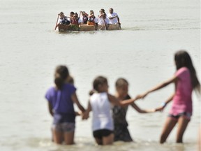 The Musqueam Indian Band launched the first canoe made on the reserve in 30 years Saturday.