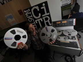 CiTR FM program director Sarah Cordingley with some of the old reel-to-reel tapes that were digitized as part of a three-year-long project by UBC.