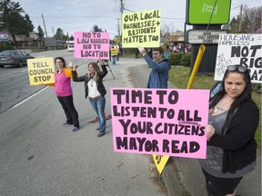 Maple Ridge residents rally in May against the conversion of a Lougheed Highway motel into a homeless shelter.