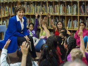 Premier Christy Clark was all smiles at Panorama Park Elementary School in Surrey in May, but her government has systematically underfunded public school in B.C., Alex Hemingway writes.