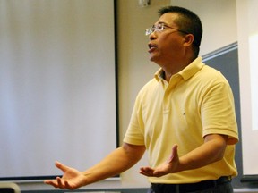 Wang Yingming, partner at Softbank Asia Infrastructure Fund and researcher at the Institute of Urban Environment at the Chinese Academy of Sciences, speaks at a Grizzly Bear Institute seminar at the UBC Forest Sciences Centre on Wednesday, Aug. 17.