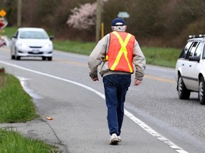 The death of a pedestrian on Mount Newton Cross Road last month has spurred two women to take action to make the area safer. Samantha Hunt came up with an idea to have reflective vests for people to borrow from bins placed on the side of the Mount Newton Cross Road, while Megan Ereiser decided to circulate a petition calling for streetlights and a sidewalk.