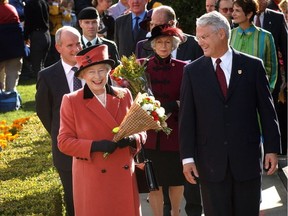 The Queen enters the Empress Hotel in Victoria in 2002. Despite having enjoyed a long list of royal visits, Victoria is treating the imminent arrival of the Duke and Duchess of Cambridge much like the Second Coming.