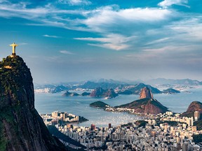 Aerial view of Rio De Janeiro. Corcovado mountain with statue of Christ the Redeemer urban areas of Botafogo and Centro Sugarloaf mountain.