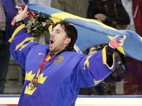Sweden&#039;s goalie Henrik Lundqvist celebrates after beating Finland 3-2 to win the gold medal in the 2006 Winter Olympics men&#039;s ice hockey gold medal game Sunday, Feb. 26, 2006, in Turin, Italy. When Henrik Lundqvist carried a Swedish flag around the ice at the 2006 Turin Olympics with a gold medal dangling from his neck, he was a fresh-faced kid days shy of his 24th birthday. THE CANADIAN PRESS/AP, Gene J. Puskar