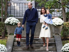 Prince William and Catherine, the Duchess of Cambridge, with their children Prince George (left) and Princess Charlotte arrive for a children’s party for military families on the grounds of Government House in Victoria on Thursday, part of their week-long visit to B.C. and the Yukon.