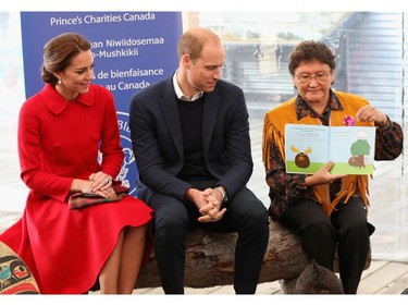 Catherine, Duchess of Cambridge and Prince William, Duke of Cambridge sit as stories are read to children at McBride Museum during the Royal Tour of Canada on September 28, 2016 in Whitehorse, Canada. Prince William, Duke of Cambridge, Catherine, Duchess of Cambridge, Prince George and Princess Charlotte are visiting Canada as part of an eight day visit to the country taking in areas such as Bella Bella, Whitehorse and Kelowna