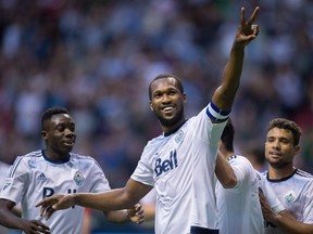 Vancouver Whitecaps' Kendall Waston, centre, celebrates his goal against Crystal Palace as Alphonso Davies, left, and Kianz Froese, right, watch during the second half of an international friendly soccer game in Vancouver, B.C., on Tuesday July 19, 2016. After disappointing starts the last two years, and with the CONCACAF Champions League quarter-finals set to get underway in February, head coach Carl Robinson says he will be taking his team to Europe in hopes of increasing the tempo in preparation for the 2017 campaign.