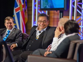 Shane Gottfriedson (centre), B.C. regional chief for the Assembly of First Nations, on a panel at a B.C. Business Summit forum last year.