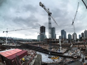 High-rise construction continues at Brentwood Town Centre in Burnaby. Almost 13,000 units were presold across Metro Vancouver in the first half of this year alone, surpassing the total for each of the years between 2010 and 2014, according to Fifth Avenue Real Estate Marketing.