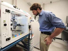 Ben Britton in action in the materials lab at Simon Fraser University in Burnaby, BC., September 28, 2016.