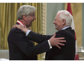 Governor General David Johnston invests Stephen Toope as an Officer of the Order of Canada during a ceremony at Rideau Hall, Friday May 13, 2016 in Ottawa. Toope, the director of the University of Toronto's Munk School of Global Affairs, has been nominated as vice-chancellor of the University of Cambridge.