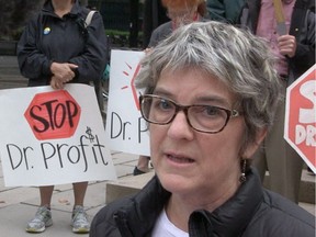 Colleen Fuller of the  Independent Patient Voices Network joins anti-privatization protesters outside the Vancouver Law Courts where the  trial is taking place over the next six months.