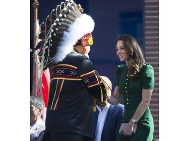 The Duchess of Cambridge shakes hands with a native chief at an event at the University of British Columbia's Okanagan campus in Kelowna, B.C., Tuesday, Sept. 27, 2016.