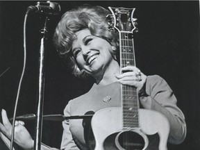 February 20 1972. Dolly Parton performs as part of the Porter Wagoner show at the Queen Elizabeth Theatre. Dan Scott/Vancouver Sun. For a John Mackie story. [PNG Merlin Archive]