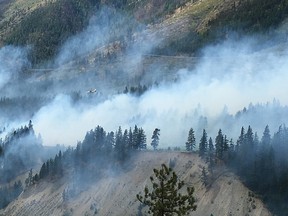 Water bombers attack the South Spencer Road wildfire, two kilometres south of Lytton on Wednesday, Aug. 31., 2016.