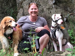 Laurie McPhee, with her dogs Quincy and Skye, runs a course teaching pet owners canine first aid.