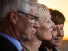Federal politicians Jim Carr (left), the minister of natural resources, and Minister of the Environment and Climate Change Catherine McKenna joined B.C. Premier Christy Clark to announce the federal approval of the Pacific Northwest LNG project last week.