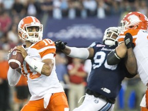 BC Lions quarterback Jonathon Jennings (10) looks for the pass during first half CFL football action against the Toronto Argonauts, in Toronto on Wednesday, August 31, 2016.