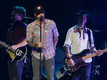 Dallas Smith ( C ) opens for Keith Urban at Rogers arena, Vancouver, September 10 2016.