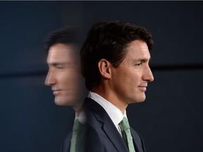 Prime Minister Justin Trudeau arrives at Wednesday’s news conference in Ottawa, where he fielded questions on pipeline politics, and specifically on the Northern Gateway project.