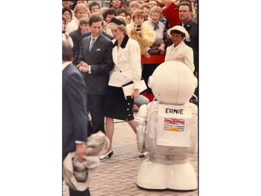 Prince Charles and Princess Diana at Expo 86, with Expo Ernie in the foreground.