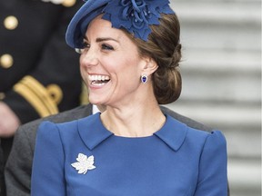 Catherine, Duchess of Cambridge, attends the official welcome ceremony for the royal visit at the B.C. legislature on Saturday. Kate is wearing the historic brooch made by a Langley jeweller's father.