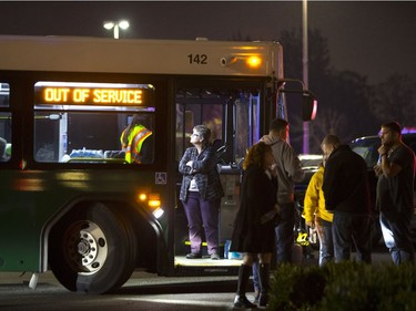 BURLINGTON, WA - SEPTEMBER 23: The scene outside the Cascade Mall as people are evacuated on buses after three women were reportedly shot dead and a man critically injured following a shooting at the shopping center on September 23, 2016 in Burlington, Washington. The suspect is believed to still be at large.