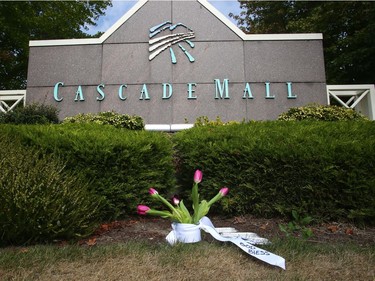 BURLINGTON, WA - SEPTEMBER 24: Flowers were placed in front of an entrance to the Cascade Mall on September 24, 2016 in Burlington, Washington. Five people were killed last night when a gunman opened fire in the shopping mall.