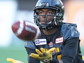 Terrell Sinkfield warms up before playing against the Lions in 2014.