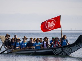 Prince William, Duke of Cambridge and Catherine, Duchess of Cambridge paddle with Haida paddlers aboard a Haida war canoe in Skidegate, BC, September, 30, 2016.