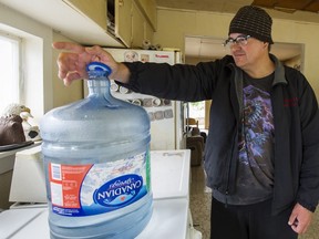 Darren Dolan pays for water to be trucked in for washing, laundry and showers at his home on the Semiahmoo reserve. He also buys bottled water for drinking and cooking.