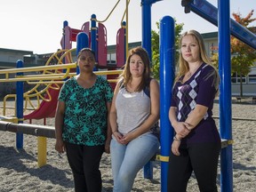Krystal Ziprick (centre) president of the PAC at KB Woodward Elementary in Surrey, BC, poses for a photo with Seema Prasad (left), secretary of the PAC and Tricia Halcrow, vice-president, on the primary school playground. The PAC was planning on building a playground for the intermediate-grade children but the PAC bank account was emptied and the RCMP is investigating.