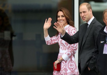 The Duke and Duchess of Cambridge are escorted down to Harbour Air Terminal in Victoria, B.C., Sunday, Sept 25, 2016 where they departed on a float plane on their way to Vancouver for planned events.